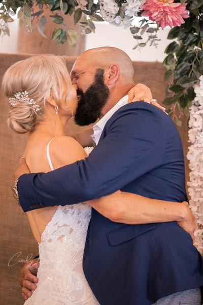 Bride & groom kiss
