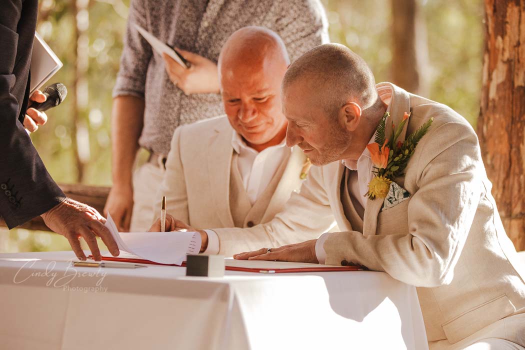Gay couple signing registry